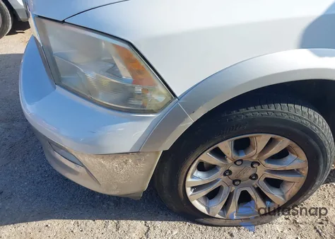 2012 Ram 1500 Laramie из США, поврежденный, VIN 1C6RD6NT9CS110093